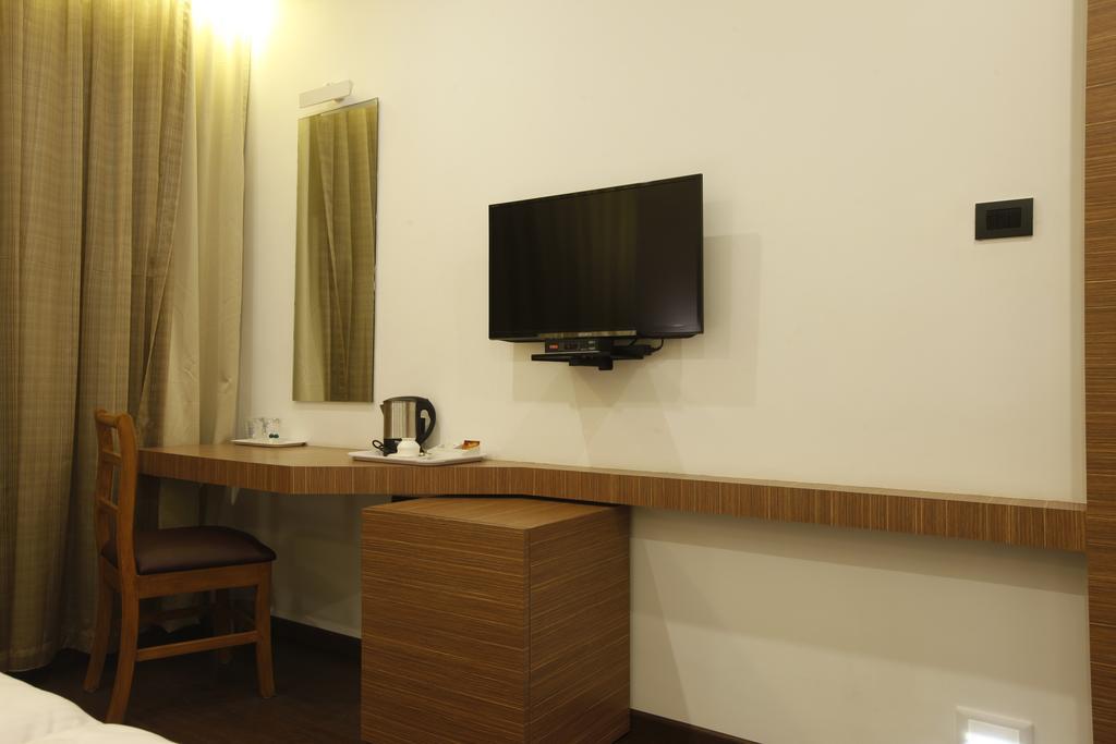 Brownstar Boutique Hotel شيناي الغرفة الصورة
